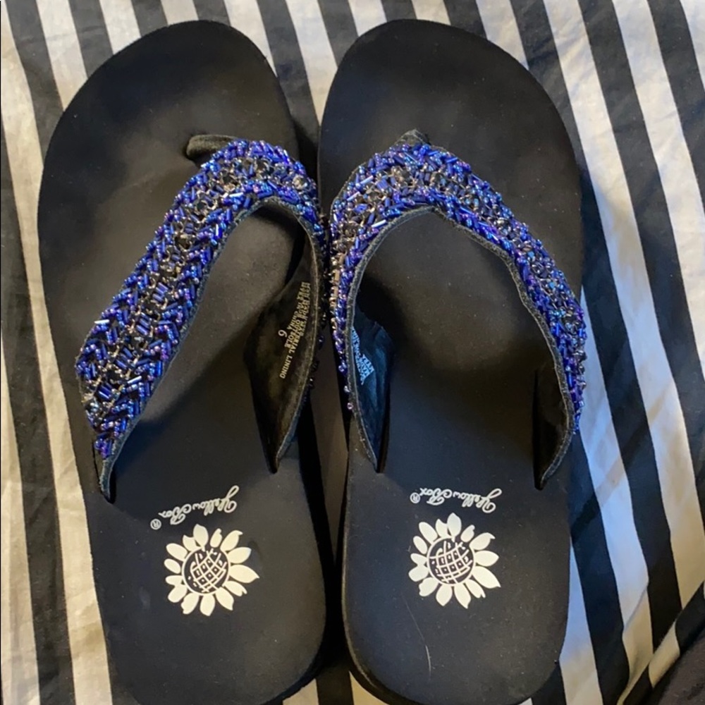 Yellow box flip flops